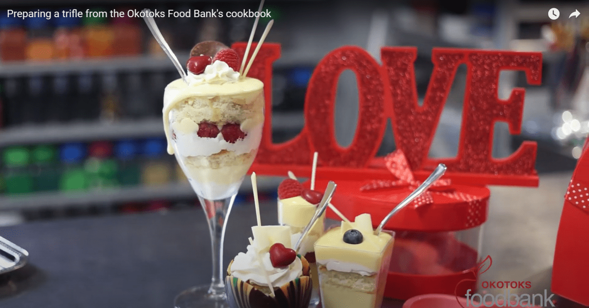 Preparing a trifle from the Okotoks Food Bank's cookbook
